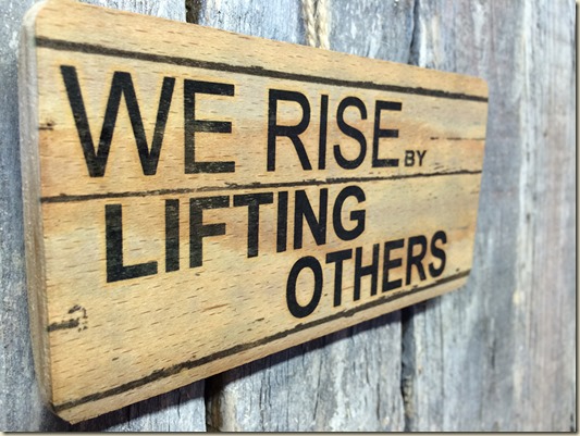 We rise by lifting others